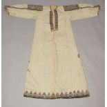 A 19TH CENTURY PALESTINIAN DRESS, with decorative embroidered panels to shoulders.