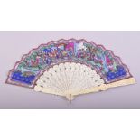 A VERY GOOD CHINESE CANTON CARVED IVORY FAN in original case, the fan opening to reveal a