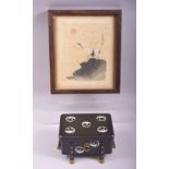 A JAPANESE BLACK LACQUER AND MOTHER OF PEARL INLAID BOX AND COVER, supported on eight feet with