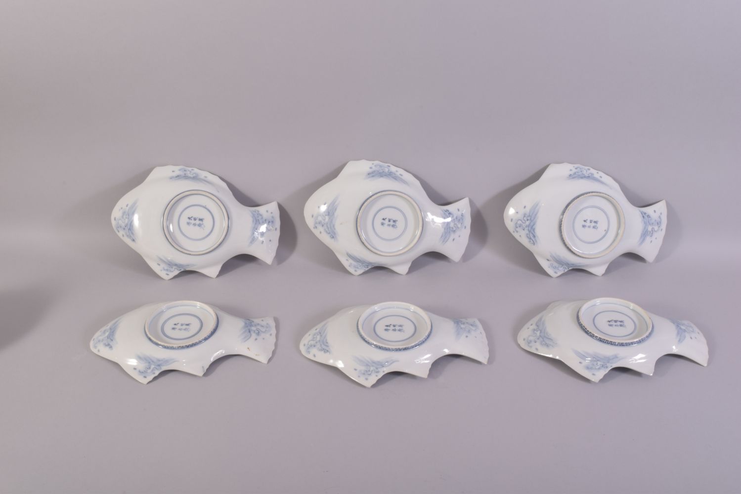 SIX CHINESE BLUE AND WHITE PORCELAIN FISH FORM DISHES, the dishes painted as fish, each dish with - Image 3 of 4