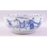 A CHINESE BLUE AND WHITE PORCELAIN PUNCH BOWL, decorated with figures and a stubborn horse, the