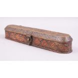 AN INDIAN LAHORE RED AND BLACK ENAMELLED BRASS PEN BOX, possibly 18th century, Mughal, 30cm long.