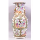A 19TH CENTURY CHINESE CANTON PORCELAIN VASE, painted with panels of figures, birds and native