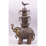 A FINE MEIJI BRONZE ELEPHANT KORO, the elephant cast with elaborate robes, carrying a three tier