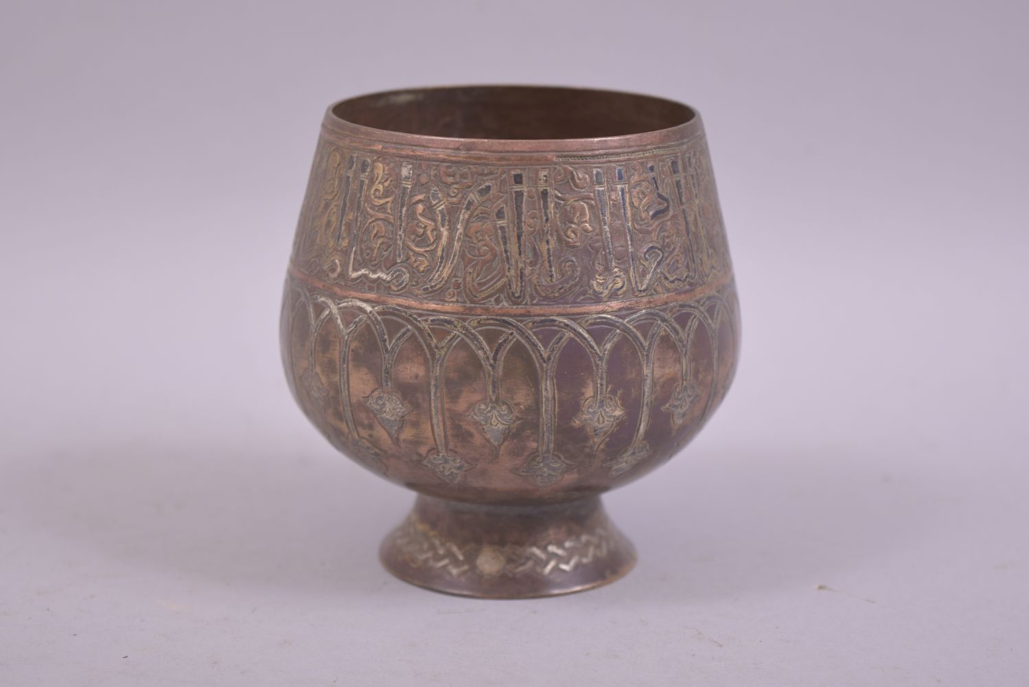 A FINE ISLAMIC SMALL BRASS SILVER AND COPPER OVERLAID GOBLET, 8.5cm high. - Image 2 of 6
