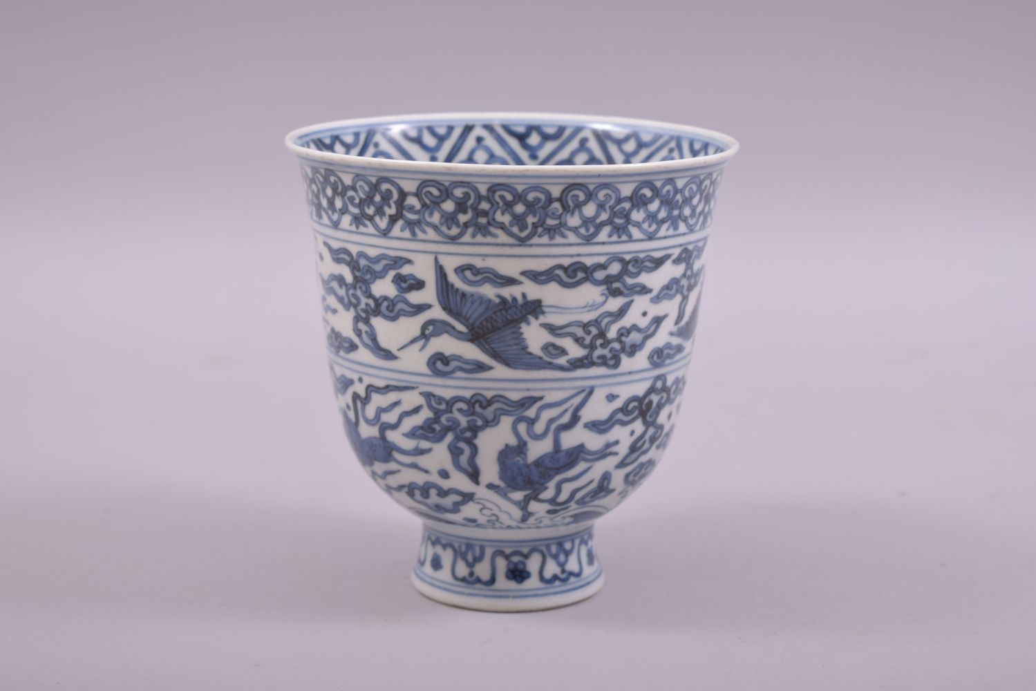 A CHINESE BLUE AND WHITE PORCELAIN PEDESTAL CUP, painted with cranes and horses, six character - Image 3 of 7