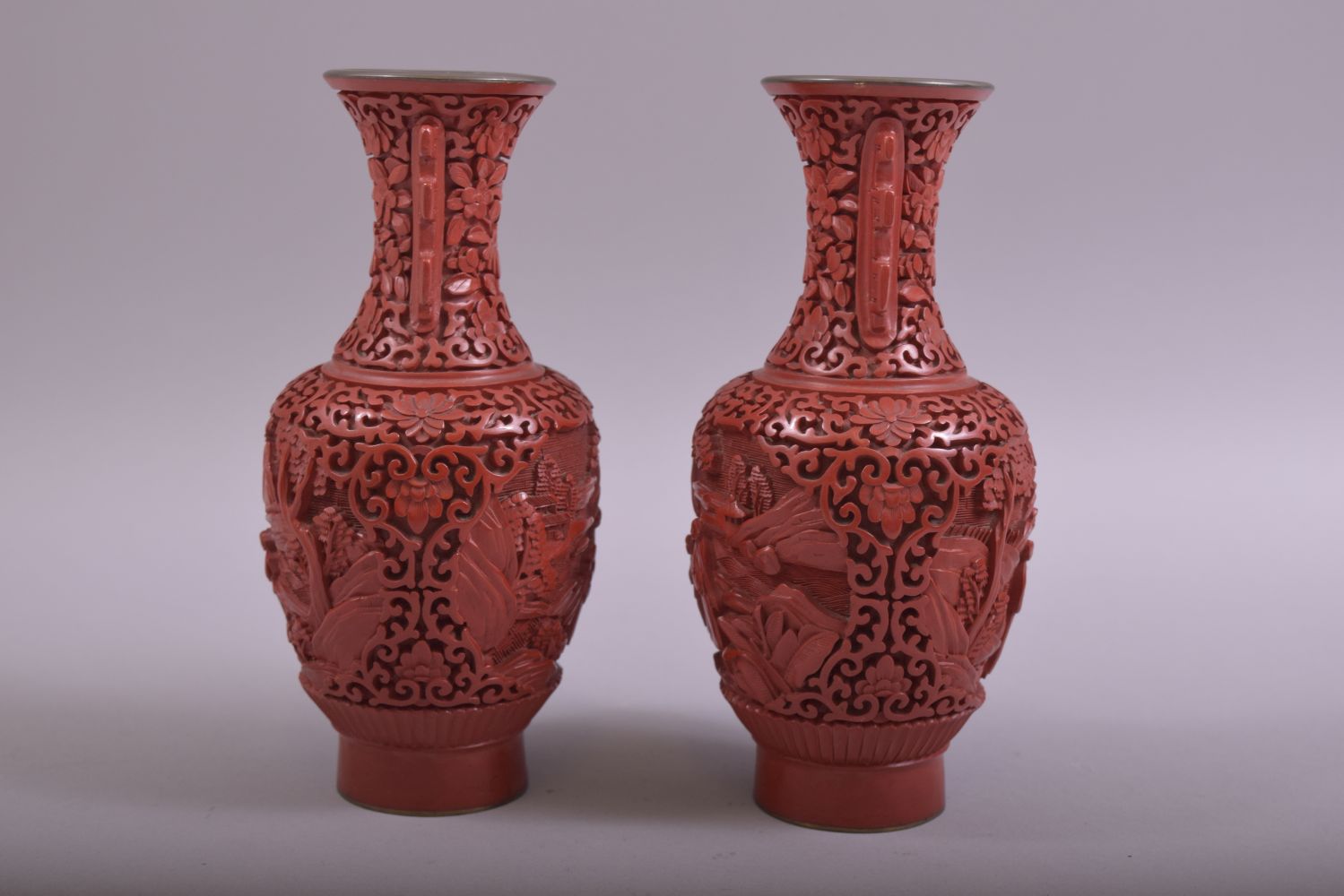 A SMALL PAIR OF CHINESE CINNABAR LACQUER TWIN HANDLE VASES, each with two panels depicting figures - Image 4 of 6
