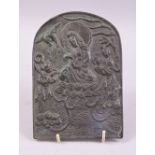A CHINESE RELIEF CAST BRONZE ARCH SHAPED PLAQUE, depicting guanyin and attendants, 16cm x 11cm.