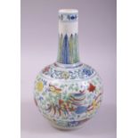 A SMALL CHINESE DOUCAI PORCELAIN BOTTLE VASE, painted in the doucai palette with a dragon and