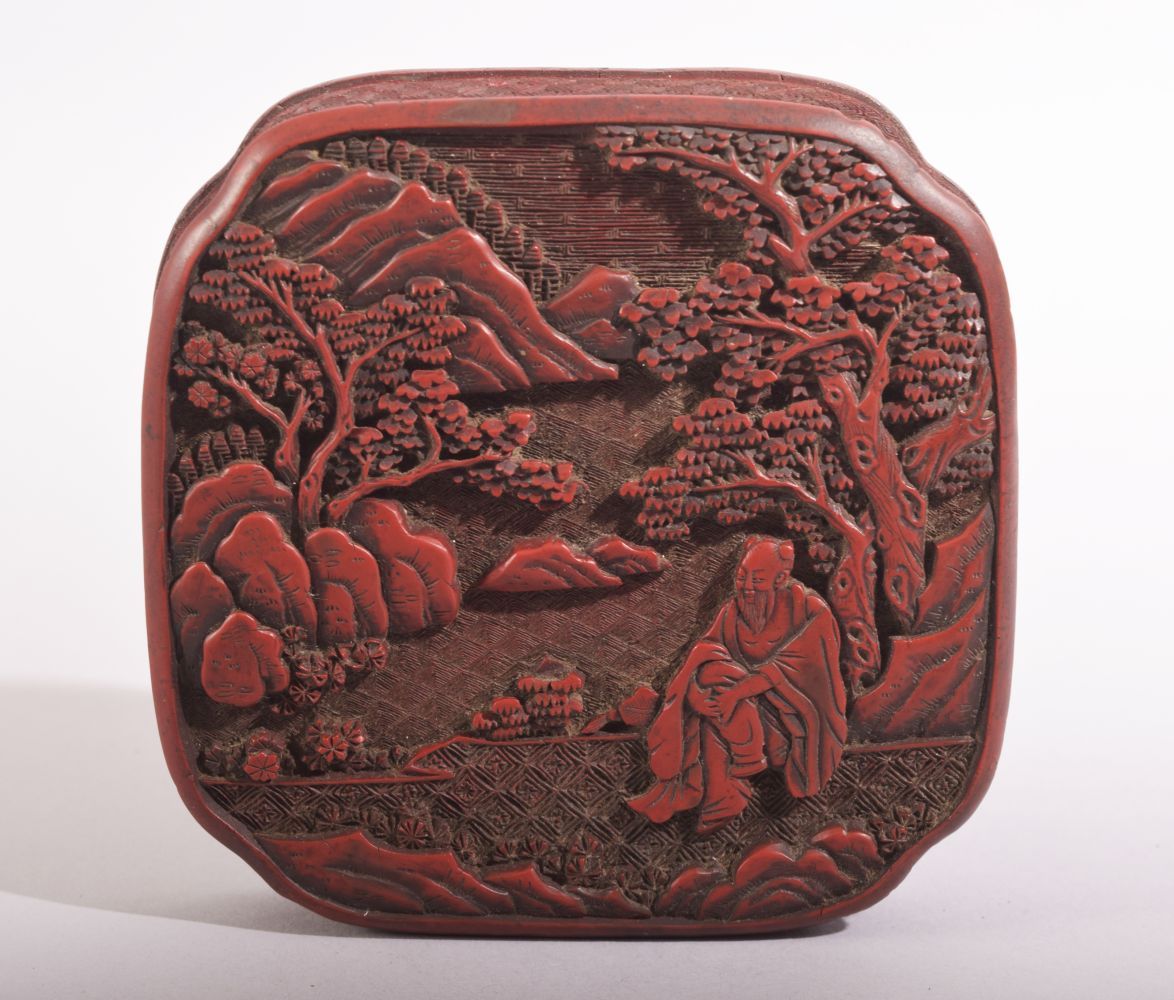 A GOOD CHINESE CINNABAR LACQUER BOX AND COVER, the lid with a sage in a meditative posture within