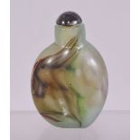 A CHINESE GREEN GLASS SNUFF BOTTLE AND STOPPER, 6cm.