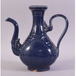 A CHINESE POWDER BLUE GLAZE WINE EWER, decorated with scrolling vines, (af), 24.5cm high.