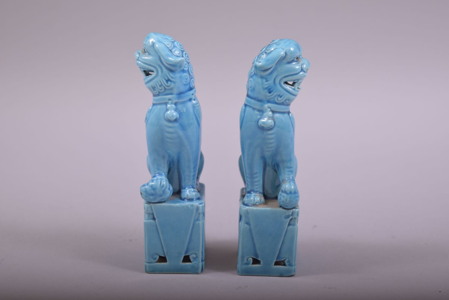 A SMALL PAIR OF CHINESE BLUE GLAZED PORCELAIN KYLIN, 11.5cm high. - Image 2 of 5