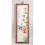 A CHINESE REPUBLIC STYLE PORCELAIN PLAQUE, in a wooden frame, with script upper left, 58cm x 19.