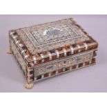 AN INDIAN TORTOISESHELL BONE AND PENWORK DECORATED DOMED TOP SEWING BOX, the lift out tray with