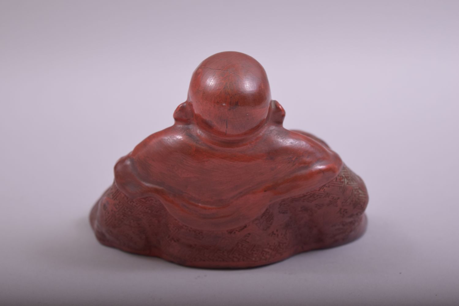 A CHINESE RED LACQUERED FIGURE OF BUDDHA, base 14.5cm wide. - Image 3 of 6