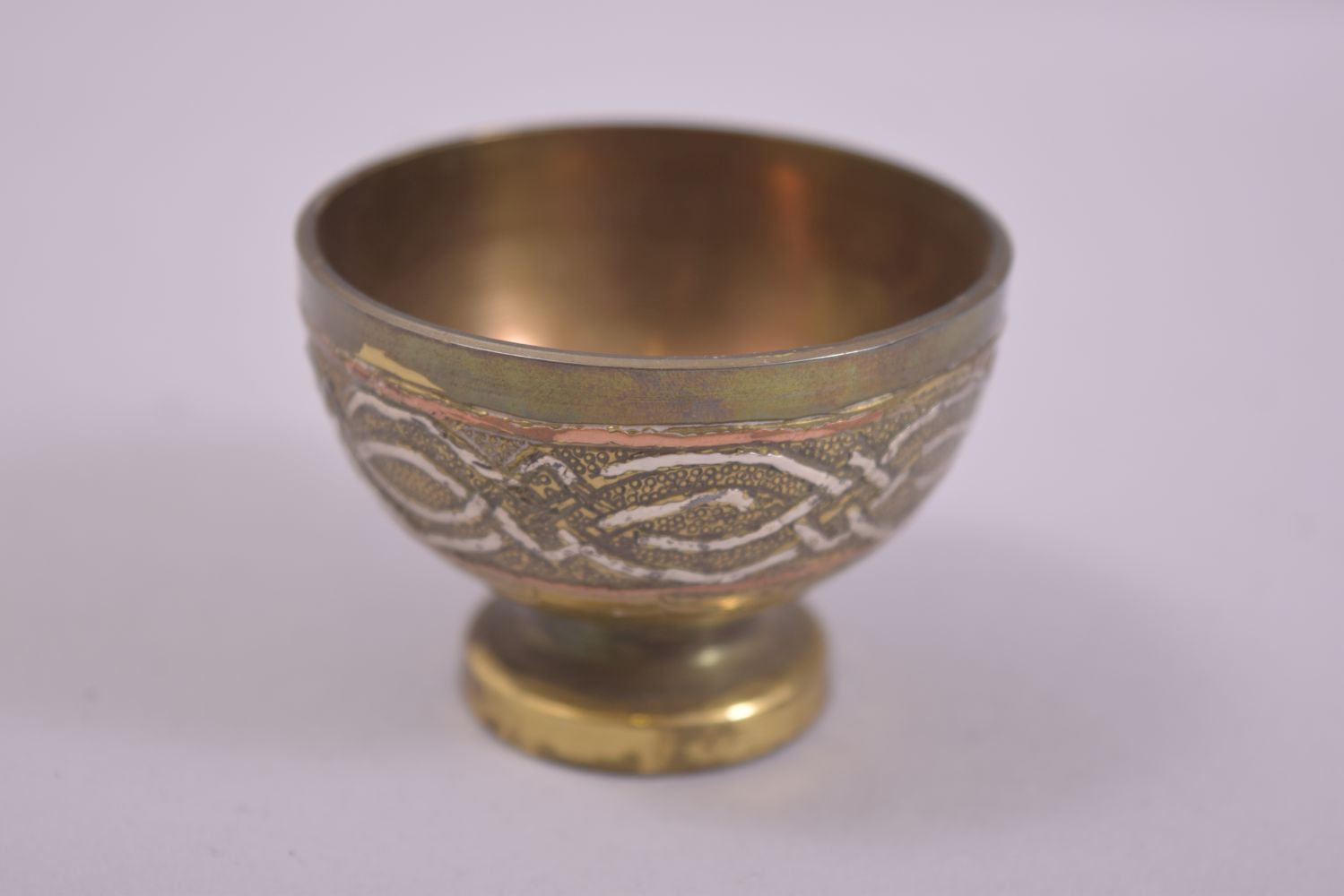 FIVE 19TH CENTURY SYRIAN SILVER AND COPPER OVERLAID PEDESTAL CUPS, diameter 5.5cm. - Image 2 of 8
