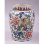 A CHINESE DOUCAI PORCELAIN VASE, painted in the doucai palette with kylin and large flower heads,