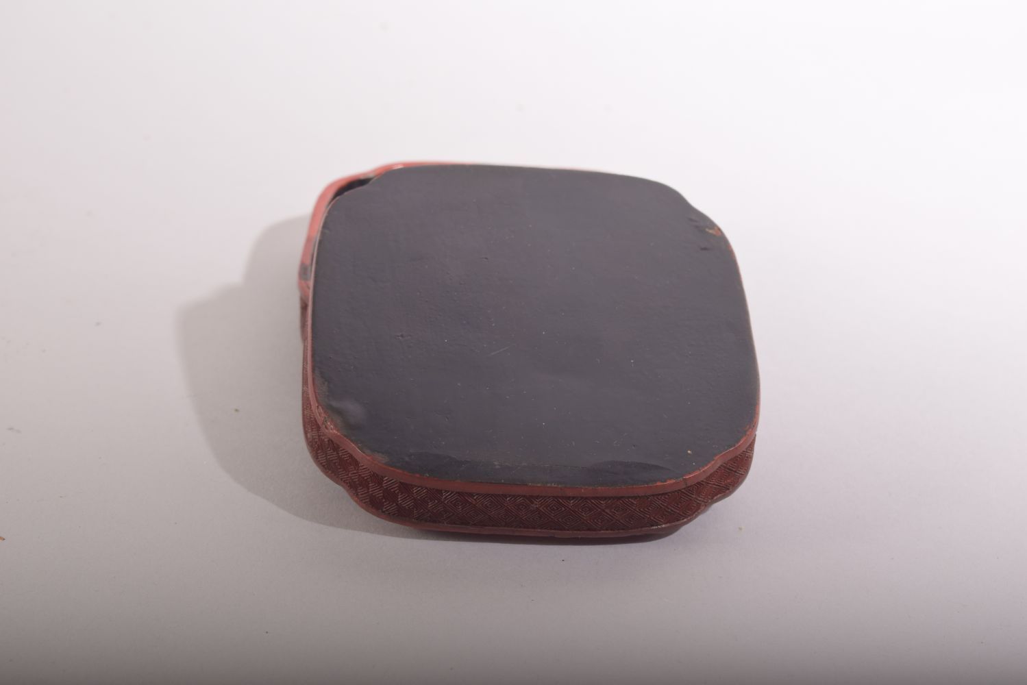 A GOOD CHINESE CINNABAR LACQUER BOX AND COVER, the lid with a sage in a meditative posture within - Image 4 of 4