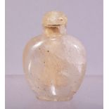 A CHINESE QUARTZ SNUFF BOTTLE AND STOPPER, 5cm.