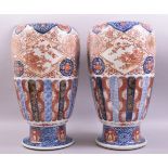 A GOOD LARGE PAIR OF JAPANESE IMARI PORCELAIN VASES, the body of each decorated in the imari palette