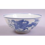 A CHINESE BLUE AND WHITE PORCELAIN BOWL, the exterior painted with mythical beasts, the interior