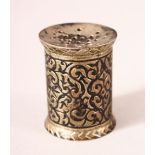 A 10TH CENTURY OTTOMAN NIELLO SILVER CALLIGRAPHERS INK POWDER CONTAINER - with embossed floral