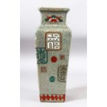 A CHINESE SQUARE FORM CRACKLE GLAZE VASE, painted with a script / icons, 31cm high.