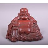 A CHINESE RED LACQUERED FIGURE OF BUDDHA, base 14.5cm wide.