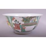 A GOOD LARGE CHINESE FAMILLE VERTE PORCELAIN BOWL, decorated with panels of figures in various