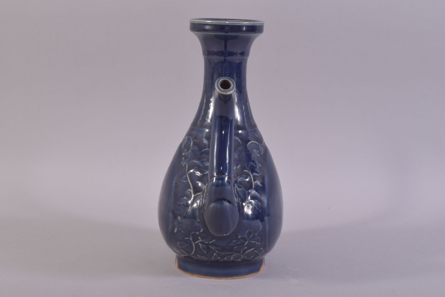 A CHINESE POWDER BLUE GLAZE WINE EWER, decorated with scrolling vines, (af), 24.5cm high. - Image 2 of 6