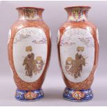 A LARGE PAIR OF JAPANESE IMARI PORCELAIN VASES, the body of each with two large panels depicting