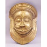 A LARGE 19TH CENTURY INDIAN BRONZE WALL MASK OF NARASIMHA / MAN LION; a fierce avatar of the Hindu