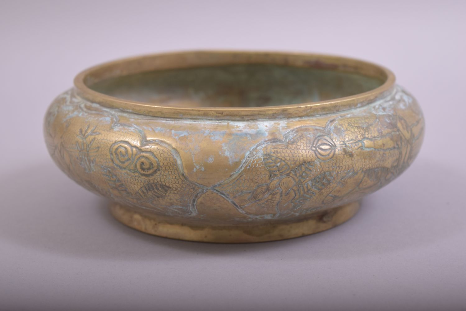 A CHINESE EMBOSSED AND CHASED BRONZE BOWL, with scenes of men on horseback in outdoor settings, - Image 4 of 7
