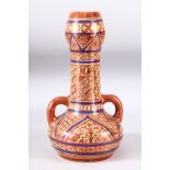 A HISPANO MOREQUE LUSTRE GLAZE TWIN HANDLE VASE, decorated with a copper and blue lustre depicting