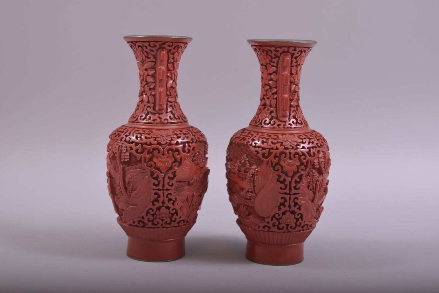 A SMALL PAIR OF CHINESE CINNABAR LACQUER TWIN HANDLE VASES, each with two panels depicting figures - Image 2 of 6