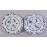 A PAIR OF CHINESE BLUE AND WHITE PORCELAIN PLATES, painted with flowers and butterfly, 23cm