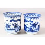 A NEAR PAIR OF JAPANESE BLUE AND WHITE PORCELAIN CUPS, decorated with boys in a landscape, 7.5cm and