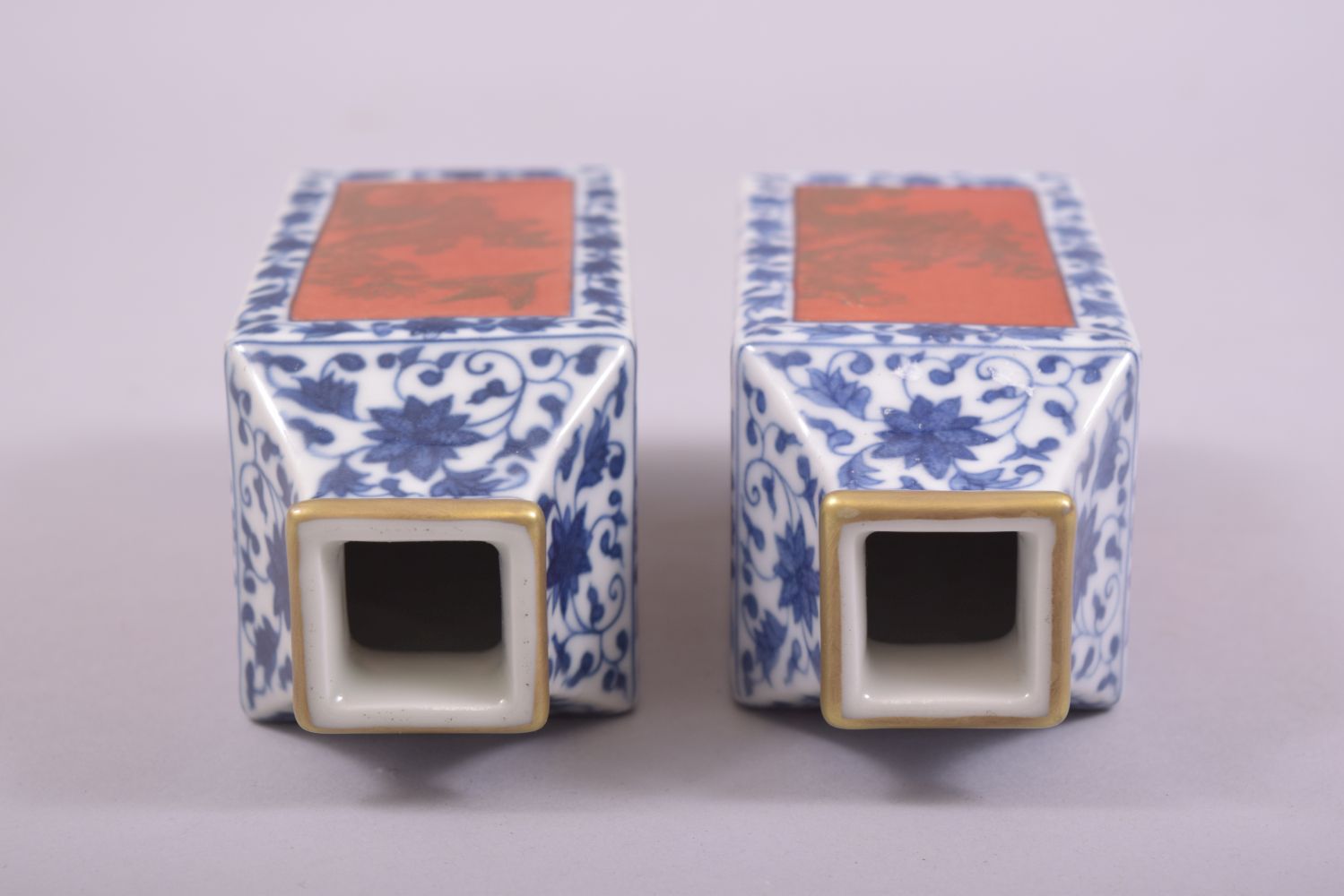 A PAIR OF SMALL CHINESE BLUE, WHITE AND CORAL RED SQUARE FORM VASES, each side with a panel of - Image 5 of 6
