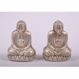 A SMALL PAIR OF SILVER BUDDHA SALT AND PEPPER VESSELS, each stamped 'sterling 950', each 4cm.