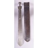 AN IMPRESSIVE EARLY INDIAN PATISSA SWORD and leather scabbard, the heavy steel blade mounded with