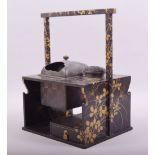 A SUPERB JAPANESE LACQUER SMOKERS CABINET / TABAKO BON, with gilt decoration, the top inset with a