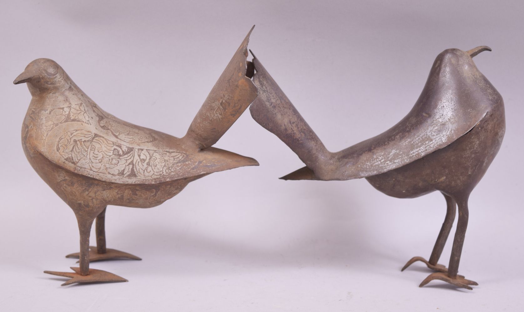 TWO 19TH CENTURY PERSIAN QAJAR STEEL MODELS OF BIRDS, each approx. 20cm long.