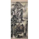 A CHINESE SCROLL PAINTING OF BUILDINGS AT THE BASE OF A MOUNTAINOUS LANDSCAPE, script and seal marks