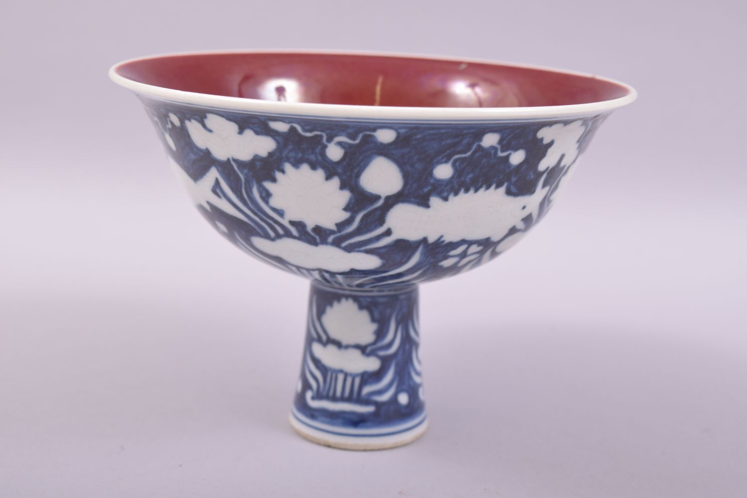 A CHINESE BLUE AND WHITE PORCELAIN STEM CUP, the exterior decorated with fish and flora, the - Image 3 of 6