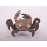 A SMALL JAPANESE BRONZE MODEL OF A CRAB, stamped underside, 6cm wide.