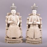 TWO SUPERB CARVED IVORY FIGURES OF A SEATED EMPEROR AND EMPRESS, the emperor sat upon a carved ivory
