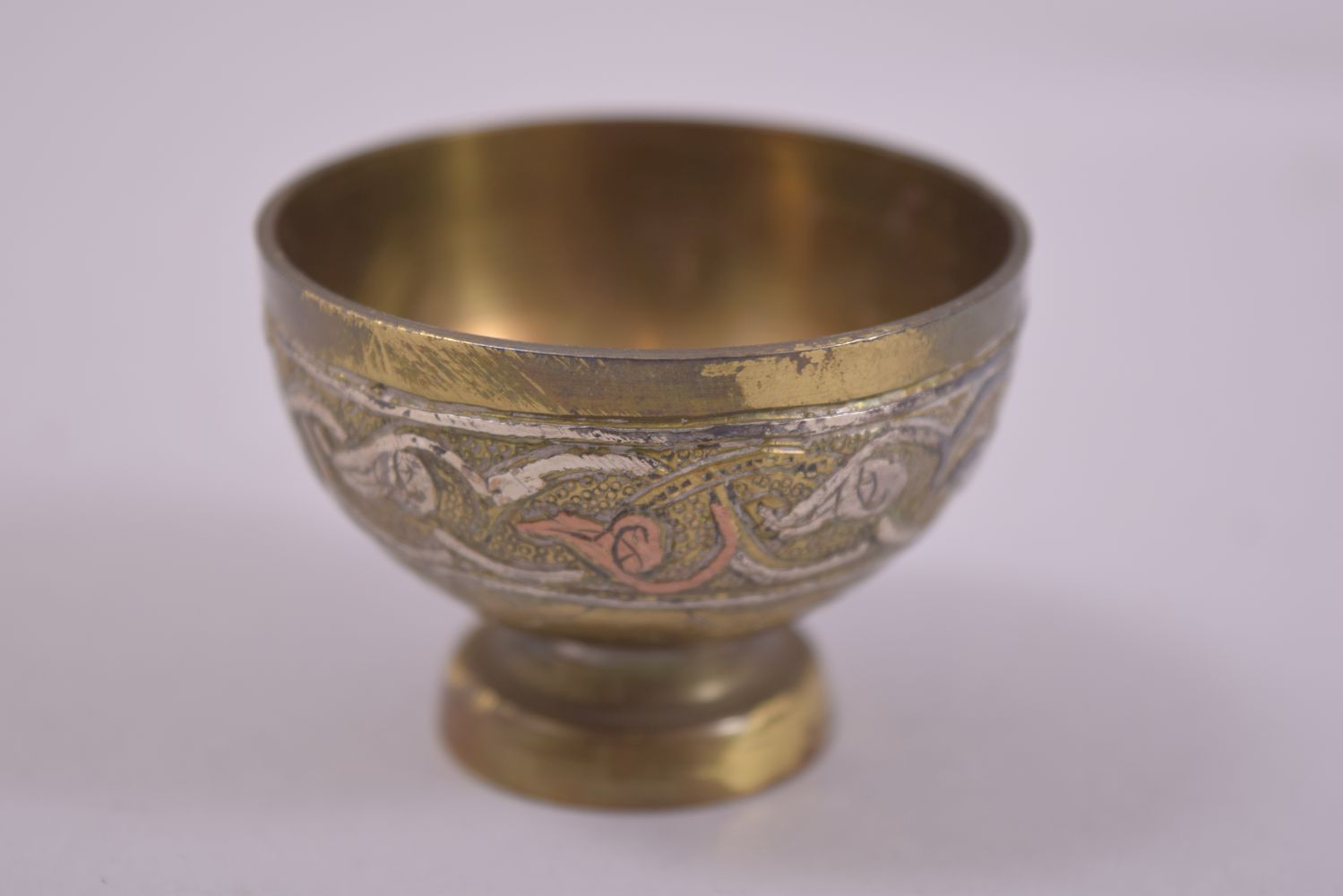 FIVE 19TH CENTURY SYRIAN SILVER AND COPPER OVERLAID PEDESTAL CUPS, diameter 5.5cm. - Image 6 of 8