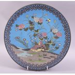 A JAPANESE CLOISONNE CIRCULAR DISH, decorated with birds and native flora, 30.5cm diameter.