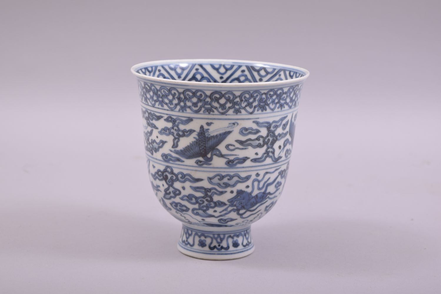 A CHINESE BLUE AND WHITE PORCELAIN PEDESTAL CUP, painted with cranes and horses, six character - Image 4 of 7